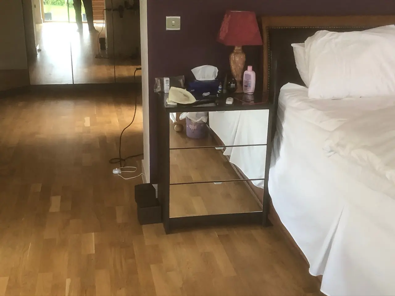 Bedside mirrored cabinet close-up, made and fitted by Sussex Design Interiors