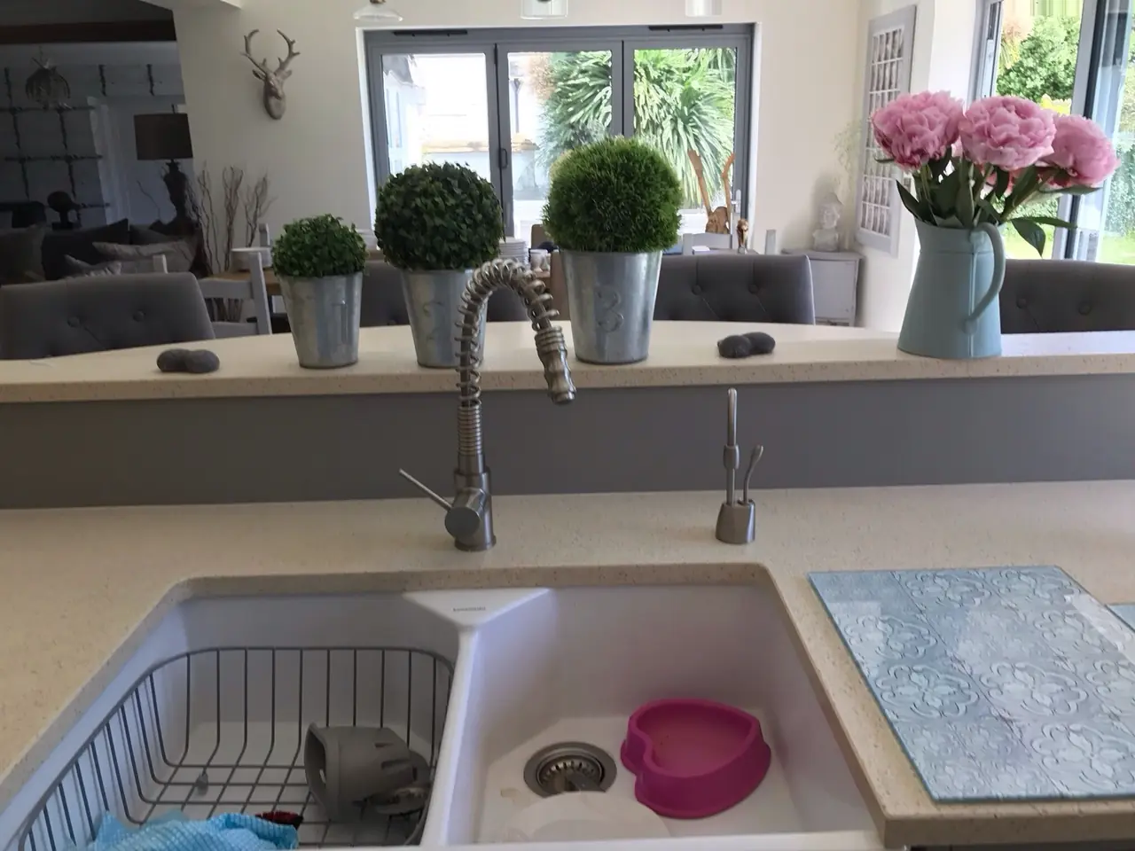 Kitchen breakfast bar sink flowers close-up, made and fitted by Sussex Design Interiors