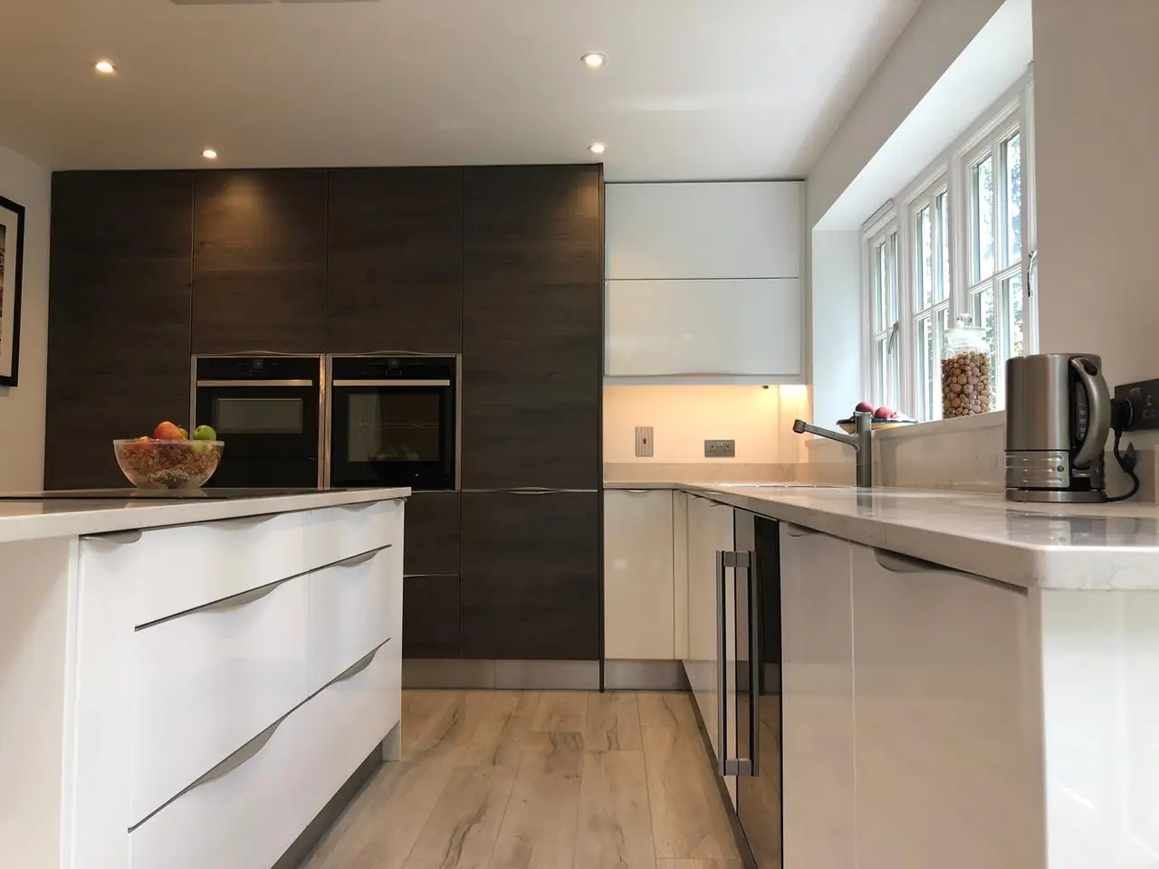 Kitchen white gloss dark wood island, made and fitted by Sussex Design Interiors