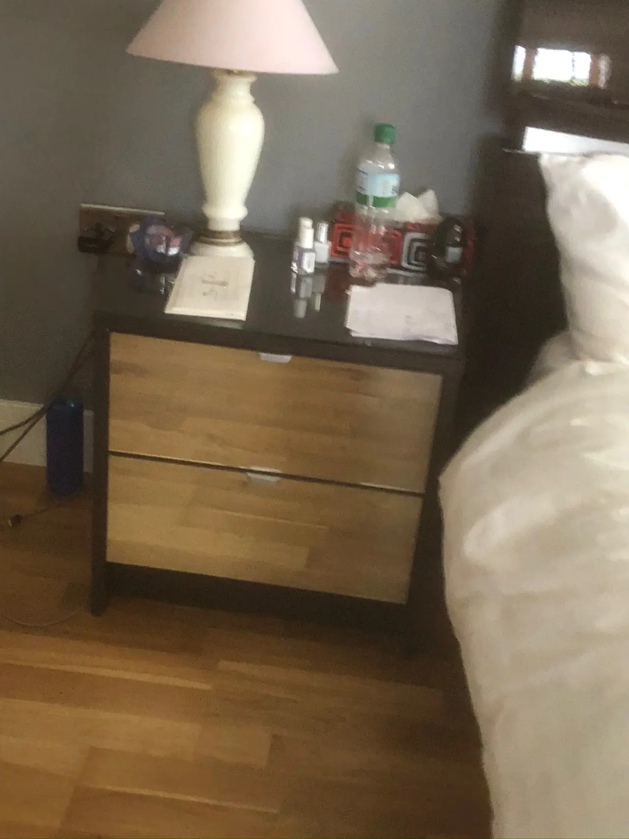 Mirrored bedside table lamp close-up, made and fitted by Sussex Design Interiors