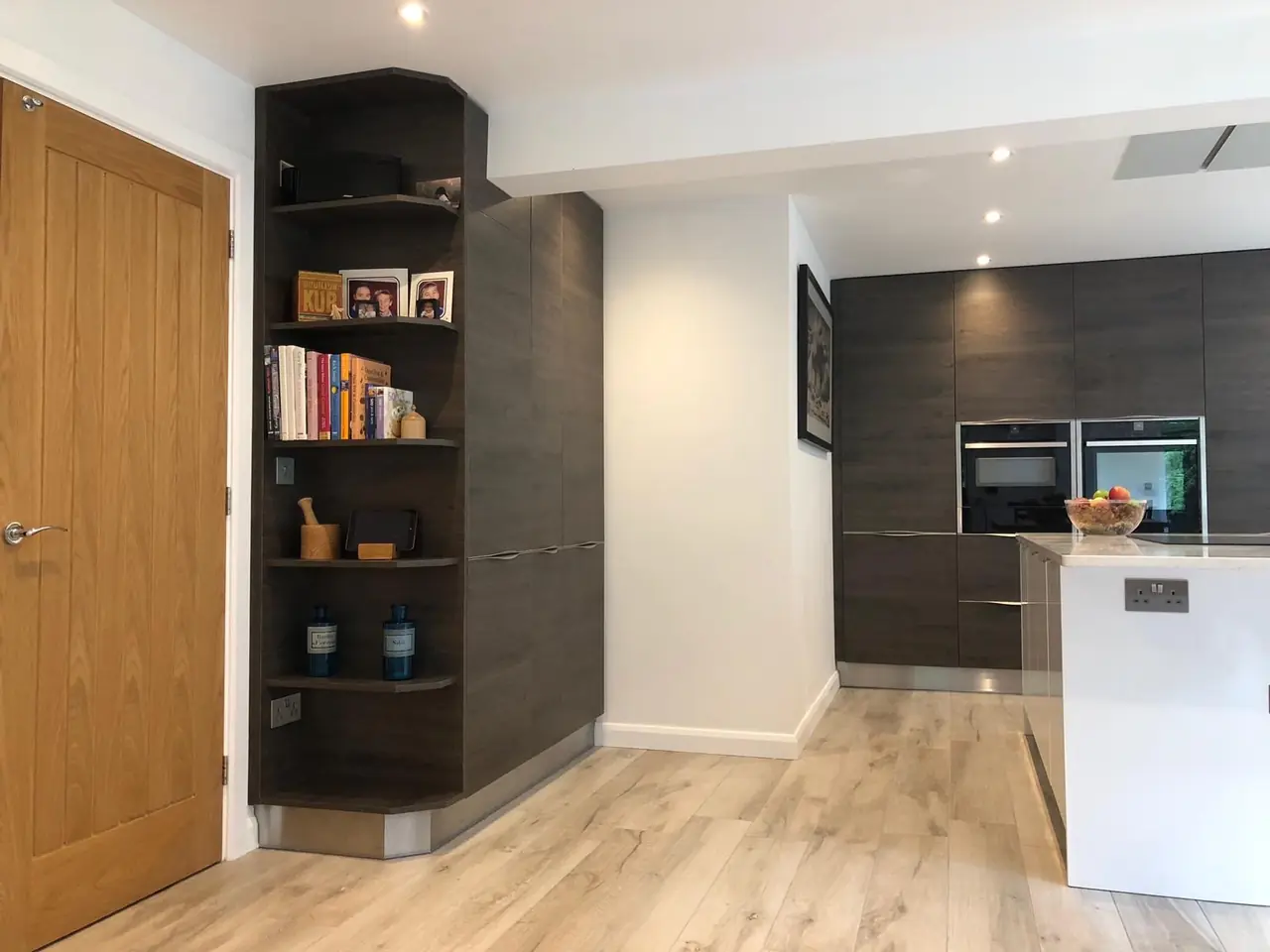 Pantry corner shelving bookcase, made and fitted by Sussex Design Interiors