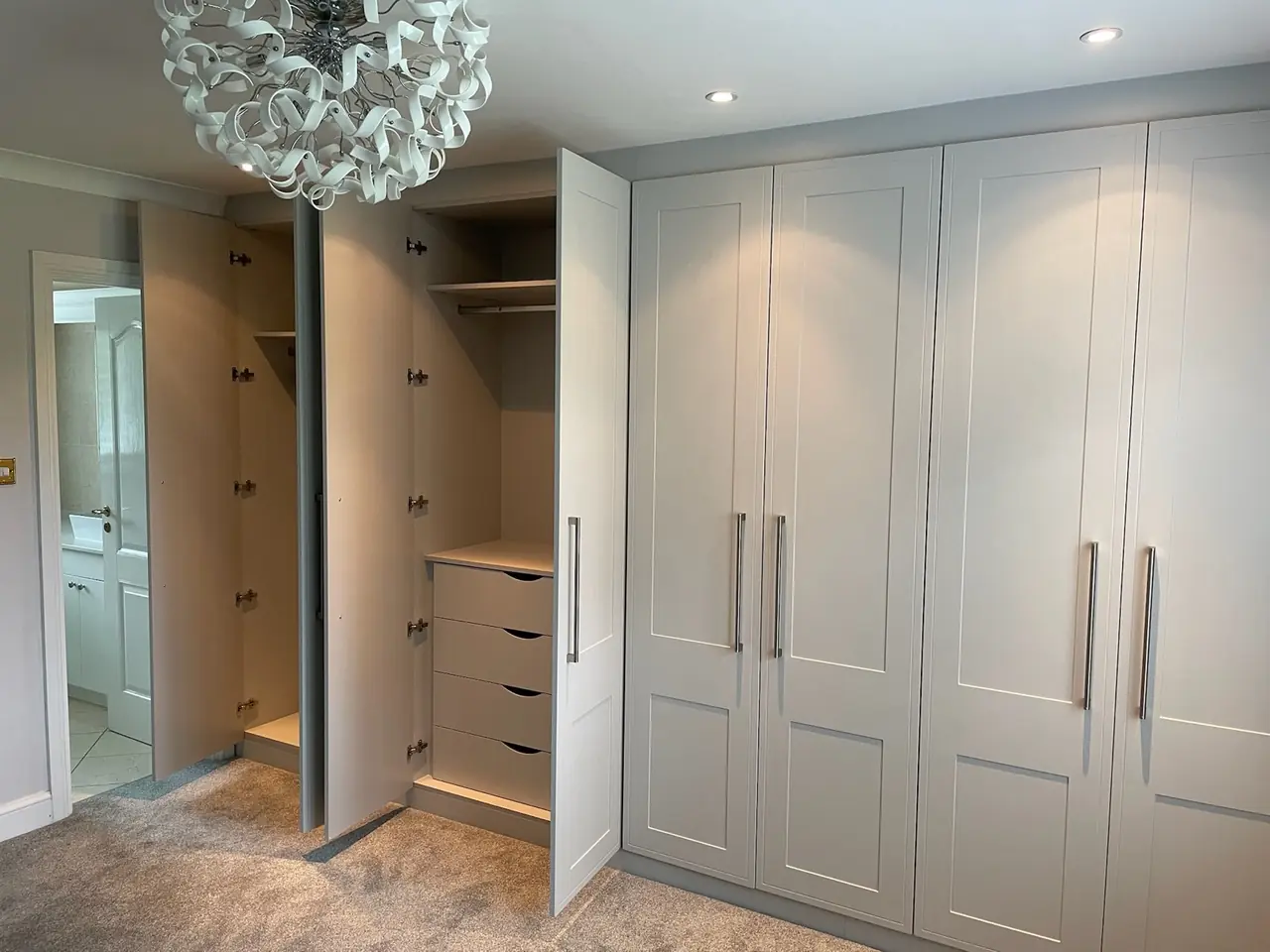 Wardrobe light grey open door drawers mirror, made and fitted by Sussex Design Interiors